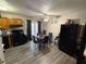 Dining area with glass table and wood flooring at 3882 Parklane Dr, Clarkston, GA 30021