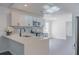 Renovated kitchen with white cabinets and quartz countertops at 5055 Promenade Sw Dr, Atlanta, GA 30331