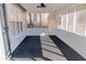 Screened porch with ceiling fan and dark flooring at 5055 Promenade Sw Dr, Atlanta, GA 30331