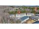 Aerial view showcasing townhome community and wooded area at 86 Trailview Ln, Hiram, GA 30141