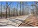 Long driveway leading to home through wooded area at 86 Trailview Ln, Hiram, GA 30141