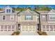 Tan and purple townhome with two-car garage at 86 Trailview Ln, Hiram, GA 30141