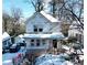 Snow-covered house under construction, wrap installed, new build at 2486 Jefferson Ter, Atlanta, GA 30344