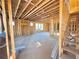 New construction, open living area framing, new home at 2486 Jefferson Ter, Atlanta, GA 30344