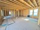 New construction, open living area framing, new home at 2486 Jefferson Ter, Atlanta, GA 30344