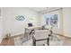 Home office with desk, chairs, and large window at 1401 Stephens View Dr, Loganville, GA 30052