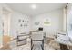 Home office with a desk and chairs near stairs at 1401 Stephens View Dr, Loganville, GA 30052