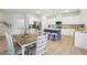 Modern kitchen with an island and stainless steel appliances at 1401 Stephens View Dr, Loganville, GA 30052