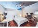 Bedroom with hardwood floors, ceiling fan and workspace at 400 W Peachtree Nw St # 2810, Atlanta, GA 30308