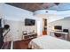 Main bedroom with hardwood floors and built-in workspace at 400 W Peachtree Nw St # 2810, Atlanta, GA 30308