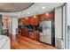 Modern kitchen with stainless steel appliances and hardwood floors at 400 W Peachtree Nw St # 2810, Atlanta, GA 30308