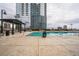 Resort-style pool with a spacious deck and city views at 400 W Peachtree Nw St # 2810, Atlanta, GA 30308