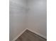Simple closet with wire shelving and gray flooring at 970 Sidney Marcus Ne Blvd # 2113, Atlanta, GA 30324