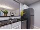 Modern kitchen with stainless steel appliances and granite countertops at 970 Sidney Marcus Ne Blvd # 2113, Atlanta, GA 30324