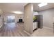 Open concept kitchen and living room with stainless steel appliances and fireplace at 970 Sidney Marcus Ne Blvd # 2113, Atlanta, GA 30324