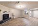 Bright living room with hardwood floors, fireplace and kitchen view at 970 Sidney Marcus Ne Blvd # 2113, Atlanta, GA 30324