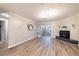 Spacious living room featuring hardwood floors and fireplace at 970 Sidney Marcus Ne Blvd # 2113, Atlanta, GA 30324