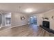 Living area with hardwood floors, fireplace and access to bathroom at 970 Sidney Marcus Ne Blvd # 2113, Atlanta, GA 30324