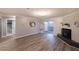 Living room with hardwood floors, fireplace and bathroom access at 970 Sidney Marcus Ne Blvd # 2113, Atlanta, GA 30324