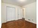 Well-lit bedroom with hardwood floors and double door closet at 2070 Brannen Se Rd, Atlanta, GA 30316