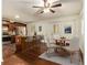 Virtually staged kitchen with an island, stainless steel appliances and hardwood floors at 2070 Brannen Se Rd, Atlanta, GA 30316