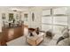 Virtually staged living room with hardwood floors, and a comfortable sitting area at 2070 Brannen Se Rd, Atlanta, GA 30316