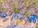 Aerial view of a residential area with houses and trees at 396 Southern Trace Dr, Rockmart, GA 30153