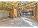 Unfinished basement with high ceilings and garage access at 396 Southern Trace Dr, Rockmart, GA 30153