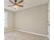 Well-lit bedroom with ceiling fan and carpet flooring at 396 Southern Trace Dr, Rockmart, GA 30153