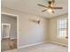 Bright bedroom with neutral decor and ceiling fan at 396 Southern Trace Dr, Rockmart, GA 30153