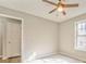 Spacious bedroom with neutral walls and ceiling fan at 396 Southern Trace Dr, Rockmart, GA 30153