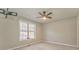 Spacious bedroom with neutral walls, carpet, and ceiling fan at 396 Southern Trace Dr, Rockmart, GA 30153