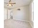 Well-lit bedroom with carpet and ceiling fan at 396 Southern Trace Dr, Rockmart, GA 30153