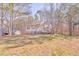 House exterior with a covered porch and large yard at 396 Southern Trace Dr, Rockmart, GA 30153