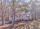 Ranch home with front porch, situated on a wooded lot at 396 Southern Trace Dr, Rockmart, GA 30153
