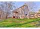 Home exterior showcasing a deck and large backyard at 396 Southern Trace Dr, Rockmart, GA 30153