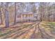 Ranch style home with covered porch and landscaped yard at 396 Southern Trace Dr, Rockmart, GA 30153