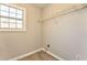 Laundry area with wire shelving and vinyl flooring at 396 Southern Trace Dr, Rockmart, GA 30153