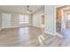 Bright living room featuring hardwood floors and vaulted ceiling at 396 Southern Trace Dr, Rockmart, GA 30153