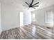 Bright bedroom with hardwood floors and ceiling fan at 545 Angier Ne Ave, Atlanta, GA 30308