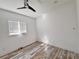 Well-lit bedroom with hardwood floors and a ceiling fan at 545 Angier Ne Ave, Atlanta, GA 30308