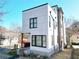 Modern three-story home with white siding and a sleek design at 545 Angier Ne Ave, Atlanta, GA 30308