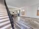 Open living room with hardwood floors and modern staircase at 545 Angier Ne Ave, Atlanta, GA 30308