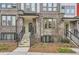 Modern townhome brick facade, stairway entrance, with minimalist landscaping at 400 Pratt Se Dr # 1403, Atlanta, GA 30315