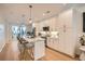 Well-lit kitchen with white cabinets, stainless steel appliances, and a center island with pendant lighting at 400 Pratt Se Dr # 1403, Atlanta, GA 30315