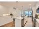 Modern kitchen featuring stainless appliances, a tile backsplash, and a breakfast bar at 400 Pratt Se Dr # 1403, Atlanta, GA 30315