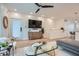 Modern living room with sleek hardwood floors, contemporary decor, and open to the kitchen at 400 Pratt Se Dr # 1403, Atlanta, GA 30315