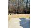 Back patio of property with large wooded lot at 4300 Henry Sw Rd, Snellville, GA 30039