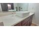 Modern bathroom vanity features a square vessel sink, quartz countertop and wood cabinets at 507 Augusta Se Dr, Marietta, GA 30067