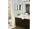 Bathroom featuring tile flooring, a modern square sink, and a vanity with dark cabinets at 507 Augusta Se Dr, Marietta, GA 30067